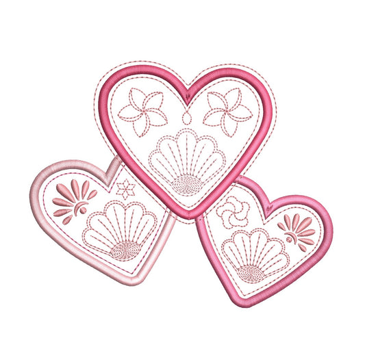 Decorative pink heart-shaped patches with floral and shell patterns on a white background by rosiedayembroidery.com